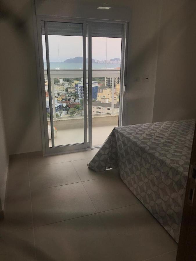 Apartamento Enseada Гуаружа Экстерьер фото